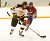 John Arundel carries the puck out of the Gustavus zone.