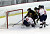 Gustavus players crashed the net against Saint Mary's.