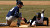 Nate Ruff slides safely back into first base.