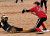 Rachael Click slides safely into third base.