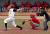 Shea Roehrkasse drives a ball to right field for a double in game one.