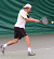 Nick Hansen rips a backhand in his doubles match.