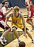 Doug Espenson drives for two of his 16 points against the Cardinals.