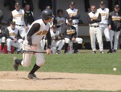 Aaron Madson lays down a bunt for a base hit.
