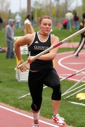 Janna Castellano finished first in the pole vault with a school record vault of 11' 8