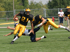 Cornerback Brian Evans returns an interception for 16 yards in the second quarter.