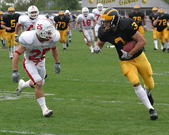 Wide receiver Clint Riegelman rambles downfield after making one his three catches on the day.