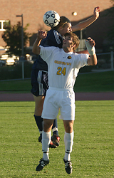 Alex Groth goes up for a header.