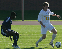 Ben Heupel works to get past a UCSC defender.