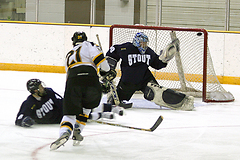 Mike Hosfield (21) sends a shot over the shoulder of the UW-Stout goalie for a goal.