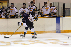 Junior Steven Jensen goes airborne after contacting a UW-Stout defender.