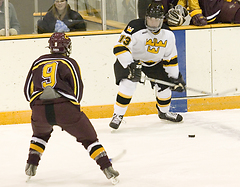 Keith Detlefsen sizes up a Cobber defender, looking for best possible option.