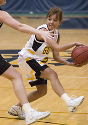 First-year Ashley Raymo looks to make the pass past a defender.
