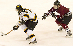 Defenseman Jon Keseley evades a Hamline defender.