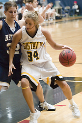 Junior post player Erin Boese backs a Bethel defender into the lane.