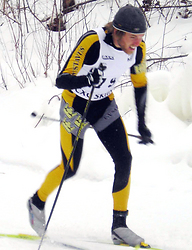 Senior Andy Rishavy races toward a finish at Mount Itasca.