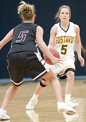 Senior Michelle Linbo advances the ball up the court.