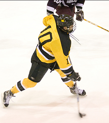 Sami Idris fires the puck toward the net.