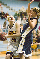 Senior Sara Boldt uses an elbow to gain some position.