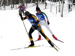Senior Andy Rishavy races ahead of UW-Green Bay's Andy Cheesbro during Sunday's freestyle race.