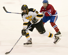 Cody Drysdale speeds past a Johnnie defender on a breakaway in the third period.