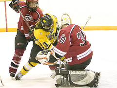 Molly Doyle makes a move on St. Bens goalie Sarah Zweber.