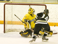 Kitty Hurley turns away a St. Olaf attempt.