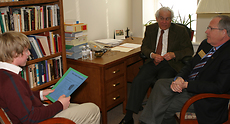 President Jim Peterson and Will Freiert, professor of classics, interview a student during this year�s Gustavus Scholarship Day.
