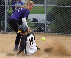 Julie Mahre scores a run in the second game.