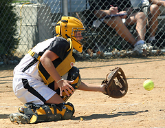 Abby Bernstein receives the ball at home plate.