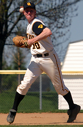 Shortstop Mike DesLauriers turns to make the throw to first base.