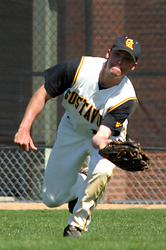 Tyler Kaus makes a diving play on a ball in right field.