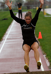 Lindsey TeBrake makes her landing during the triple jump. 