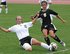 Alison Rethwisch fights for the ball.