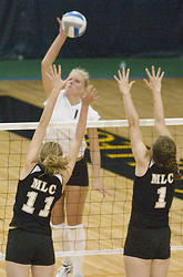 Jennifer Thelemann knocks down one of her 19 kills.