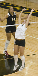 Bridget Burtzel delivers a back set.