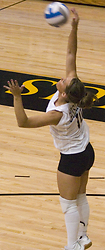 Emily Klein hits a serve for the Gusties.