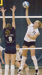 Andrea Kron hits one of her 16 kills.