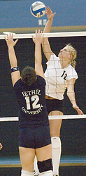 Jennifer Thelemann hits one of her 21 kills.