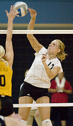 Andrea Kron hits the ball.
