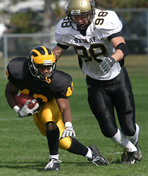 Sophomore running back Ray Wilson eludes an Ole defender during last weekend's game.