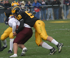 Adam Miron makes the tackle on an Augsburg ball-carrier. 