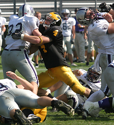 Sieling makes one of his team-high 68 tackles against St. Thomas.