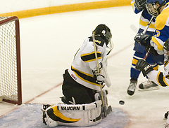 Joel Rindelaub makes a save for Gustavus.