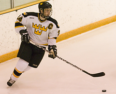 Captain Jay Phillips handles the puck.