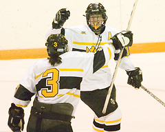 Margaret Dorer and Stefanie Ubl (3) celebrate Dorer's goal.
