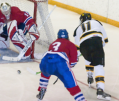 Mike Hosfield shoots the puck on net.