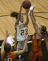 Ashley Raymo goes high for a rebound.
