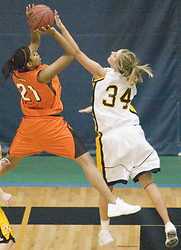 Erin Boese blocks a shot by a Wartburg player.