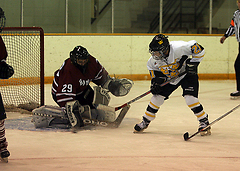 Sarah Heinbigner attempts to push one past Hamline.